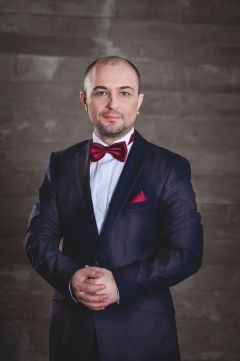 Роман Шарман